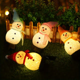 NNETM Radiant Solar Snowman Quartet: Festive Ground Plug-in Lights