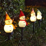 NNETM Radiant Solar Snowman Quartet: Festive Ground Plug-in Lights