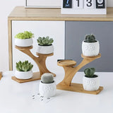 NNETM Display your favorite blooms in style with this freestanding flower pot stand