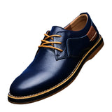 Navy leather shoe with brown laces on a blue checkered background