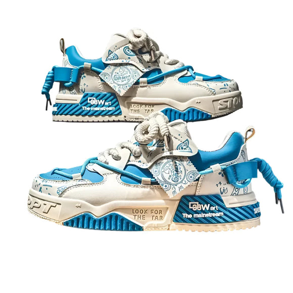 Pair of white and blue sneakers on a wooden stool with a gray background