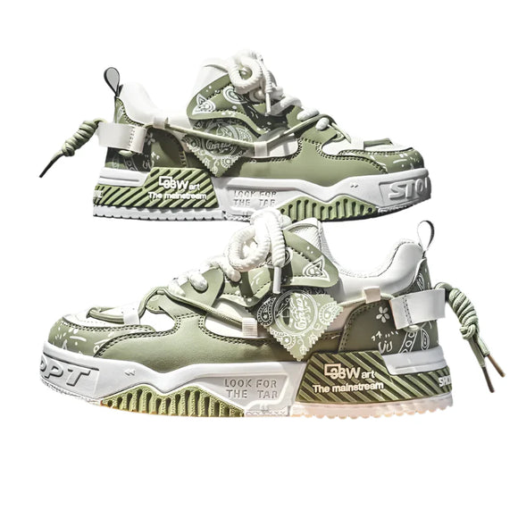 Green and white sneakers on a wooden stool with a gray background