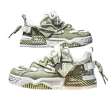 Green and white sneakers on a wooden stool with a gray background