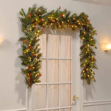 Christmas Garland with Pinecones and Red Berries