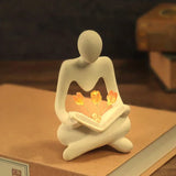 NNEOBA Elegance Illuminated: Abstract Figure Statue Lamp for Stylish Table Decor