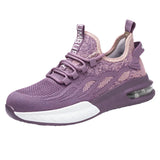 Purple sneaker with white sole on a white background