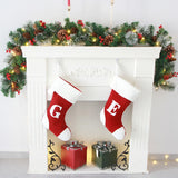 Christmas Garland with Pinecones and Red Berries