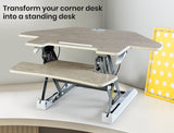 NNEDSZ Fortia Corner Desk Riser 110cm Wide Adjustable Sit to Stand for Dual Monitor, Keyboard, Laptop, Beech