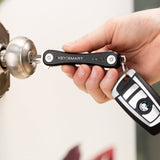 NNEDSZ iPro - Rechargable Compact Trackable Key Holder, with LED Flashlight and Bottle Opener  - Black - 2 Pack
