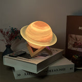 NNEDSZ Yellow 3D Saturn Ring Bluetooth Speaker with Adjustable LED Lights, HiFi Bass, USB Charging, and Immersive Sound for Home and Desktop Use