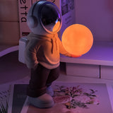 NNEDSZ Holding the romantic moon (beige top + brown pants) Creative Astronaut Bluetooth Speaker with 3D Starry Sky Lighting, Portable Wireless Moon Lamp Speaker - Perfect Gift for Space Enthusiasts