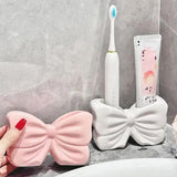 NNEDSZ White Creative Ceramic Bowknot Toothbrush Holder - Elegant Bathroom Storage for Electric Toothbrush and Toothpaste