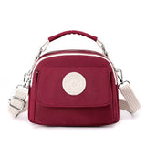 NNEDSZ Red Compact Nylon Crossbody Bag - Stylish and Versatile Shoulder Purse