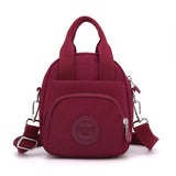 NNEDSZ Red Mini Waterproof Nylon Backpack - Lightweight Casual Crossbody Bag