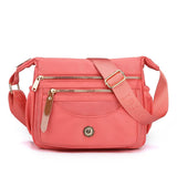 NNEDSZ Pink Nylon Crossbody Bag with Multiple Compartments - Compact and Stylish Design