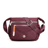 NNEDSZ Wine Red Nylon Crossbody Bag with Multiple Compartments - Compact and Stylish Design