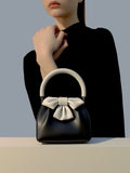 NNEDSZ Black and white Elegant Women's Two-Tone Bowknot Bucket Handbag - Stylish and Lightweight
