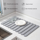 NNEDSZ White Oval Shaped Engraved Inner Frame Foldable Diatomaceous Earth Drying Mat - Super Absorbent, Fast-Drying, Non-Slip Kitchen Countertop Mat