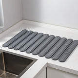 NNEDSZ Dark Gray Oval Shaped Engraved Inner Frame Foldable Diatomaceous Earth Drying Mat - Super Absorbent, Fast-Drying, Non-Slip Kitchen Countertop Mat