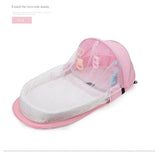 NNEDSZ Red Portable Multi-Purpose Baby Bed and Diaper Backpack - Lightweight, Waterproof, Canvas + Polyester Material, Travel Essential for Moms(With mosquito net and small toys)