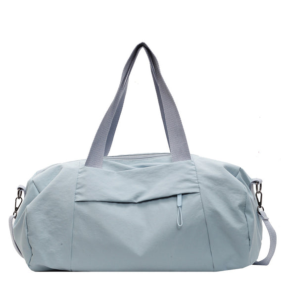NNEDSZ Blue Candy-Colored Women's Gym Duffel Bag - Large Capacity Cylindrical Travel Tote with Handles