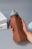 Brown and Grey Cup Lid Ultimate Foldable Silicone Water Bottle - Lightweight Leakproof Travel & Sports Hydration - 700ml