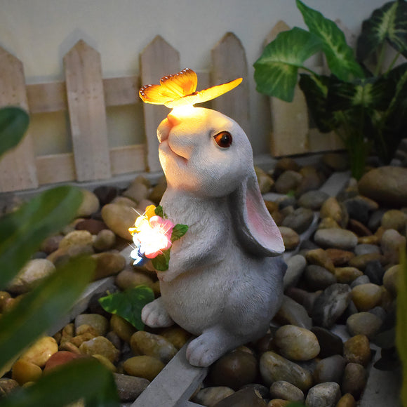 NNEDSZ Rabbit and Butterfly Charming Solar-Powered Animal Garden Statue - Waterproof Resin Figurine with Glowing LED Accents