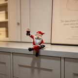 Red and White Resin Elderly Figure Ornament Seated Character Raising a Glass