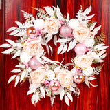 NNETM Blushing Elegance: A Pink Christmas Wreath Adorned with Baubles