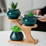 NNETM Display your favorite blooms in style with this freestanding flower pot stand