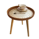 NNETM Understated elegance meets Nordic sensibilities in the Rattan Shell Table
