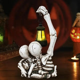 NNETM Solar Couple Skull Lantern Statue