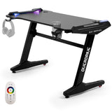 NNEDSZ Gaming Desk, 120x60cm, Carbon Fiber Styling, LED Lights, Headset Hanger, Cup Holder, Cable Management, Black