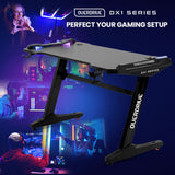 NNEDSZ Gaming Desk, 120x60cm, Carbon Fiber Styling, LED Lights, Headset Hanger, Cup Holder, Cable Management, Black