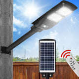 NNEIDS Solar Sensor LED Street Lights Flood Garden Wall Light Motion Pole Outdoor 60W